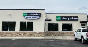 Readable Roadside Business Signage – Enterprise | 3i Graphics & Signs Enterprise building signs with large high-contrast lettering visible from a distance